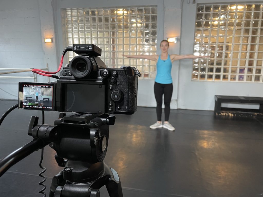 A behind-the-scenes photo of me filming the Jazz-based dance lesson with Samatha Russell