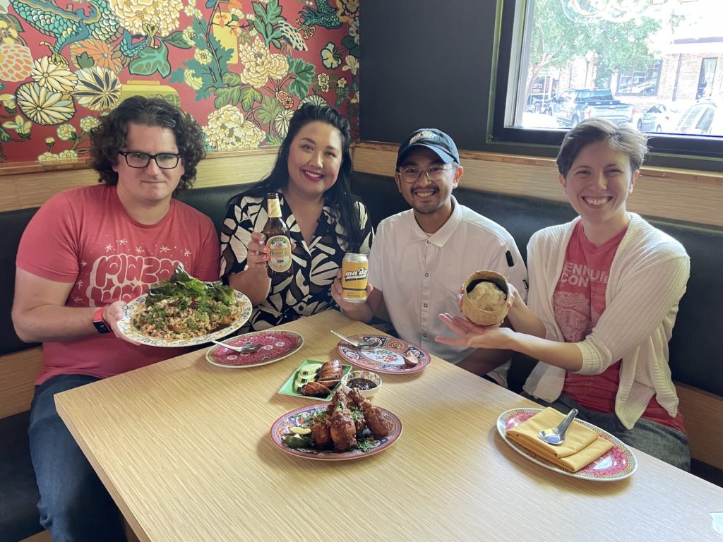 Photographic of Dennis, Phi, Chef Jeff, and Lessa at a table with some food at Ma Der Lao Kitchen in Oklahoma City.